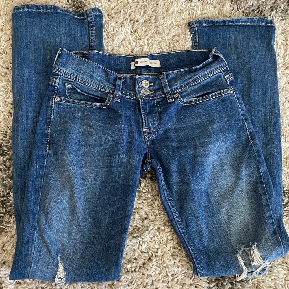 Levis 524 too superlow holey jeans